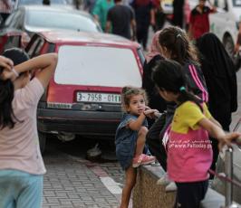  نزوح الآلاف من الفلسطينيين إلى مجمع الشفاء الطبي خوفا من القصف الإسرائيلي (16)