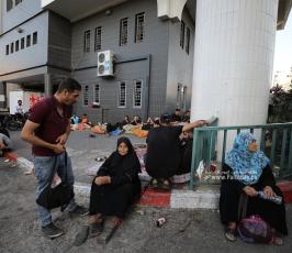  نزوح الآلاف من الفلسطينيين إلى مجمع الشفاء الطبي خوفا من القصف الإسرائيلي (2)