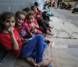  نزوح الآلاف من الفلسطينيين إلى مجمع الشفاء الطبي خوفا من القصف الإسرائيلي (8)