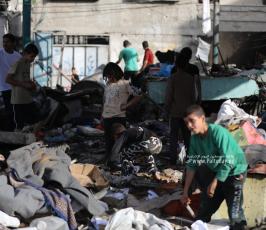 آثار القصف على مدرسة فهمي الجرجاوى بغزة ووداع الشهداء في المشفى الأهلي العربي (2)