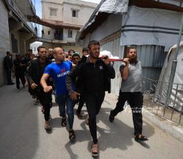 “وداع الطفل فايز أبو سمرة، الشهيد الوحيد لعائلته، بعد استهداف الاحتلال لمواطنين في حي الشجاعية… (4)