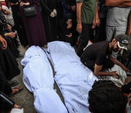 وداع شهداء من منتظرين المساعدات وقصف خيام النازحين بمدينة غزة (7)