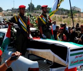 جنازة عسكرية تتستقبل روافد شهداء غزة