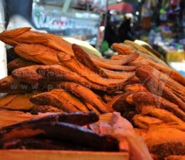 "الفسيخ".. الأكلة التي تُزين عيدَ الغزيين