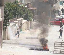 بالصوراصابات في مواجهات مع قوات الاحتلال في كفر عقب شمال القدس المحتلة