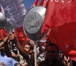 بالصور:في فلسطين.. العمال يحتفلون بيومهم العالمي على طريقتهم الخاصة