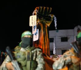 مؤتمر وعرض للقسام في الذكرى الأولى للعدوان ‫(31094161)‬ ‫‬