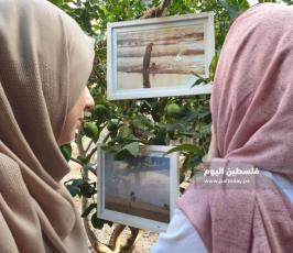 شابة من غزة تعلق معرضها الفني على أشجار منزلها (8).jpg