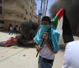 بالصوراصابات في مواجهات مع قوات الاحتلال في كفر عقب شمال القدس المحتلة