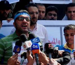 وقفة تضامنية مع الزميل المصور محمد عثمان بغزة في الذكرى الأولي لإصابته