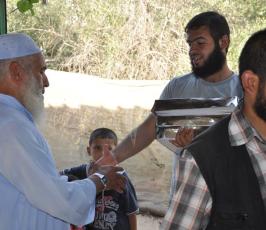 الجهادبرفح يزور عوائل الشهداء والاسرى بحلول شهر رمضان ضمن حملة تكافل الخير ‫(31290782)‬ ‫‬