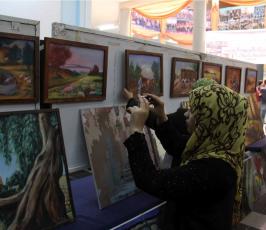 عدسة "فلسطين اليوم" في معرض الصور والكاريكاتور في الجامعة الإسلامية بغزة