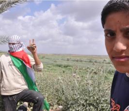 بالصور:ناشطون غزيون يحيون ذكرى يوم الأرض شرقي المنطار