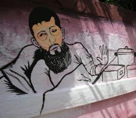 لوحة جدارية فنية اسناداً لإضراب الشيخ خضر عدنان تنظمها مهجة القدس أمام مقر الصليب بغزة  ‫(29980058)‬ ‫‬