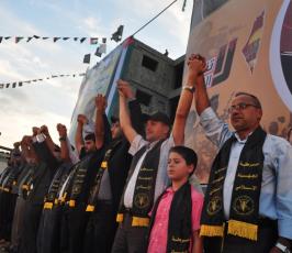 عشرات الالاف من شيوخ ونساء واطفال وقيادة الشعب الفلسطينى فى مهرجان الانطلاقة  الجهادية