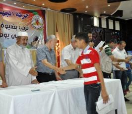 الجهاد الإسلامي تنظم إفطارا جماعياً وتوزع مئات المساعدات المالية للأيتام بغزة