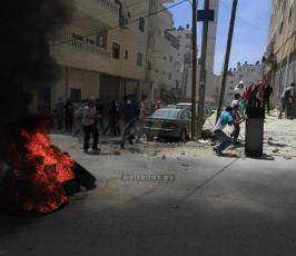 بالصوراصابات في مواجهات مع قوات الاحتلال في كفر عقب شمال القدس المحتلة