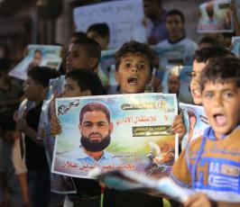  وقفة مع الاسير محمد علان  امام مقر الصليب الاحمر بمدينة غزة ‫(34865675)‬ ‫‬