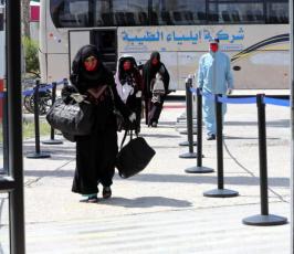  تسهيل دخول العالقين إلى قطاع غزة عبر معبر رفح البري وفق إجراءات الوقاية والسلامة من فيروس كورونا (7).jpg