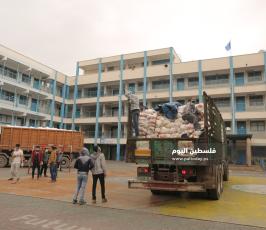  توزيع المساعدات الغذائية (9).JPG