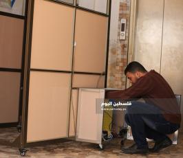 ممرًا لتعقيم الأشخاص لمواجهة تفشي فيروس كورونا (2).JPG