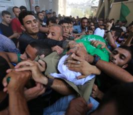  الشهيدين محمد شخصه والطفل اياد الشاعر ‫(42074635)‬ ‫‬.JPG