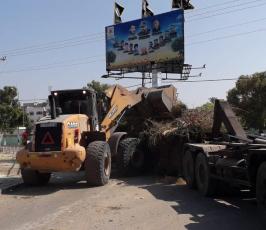 تنظيف مقبرة حي الشجاعية في شارع بغداد (14).jpg