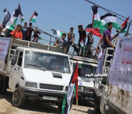 مسير للشاحنات يتوجه لمخيم ملكة شرق غزة رفضاً للحصار ‫(39256577)‬ ‫‬.JPG