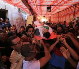  الشهيدين محمد شخصه والطفل اياد الشاعر ‫(42074641)‬ ‫‬.JPG