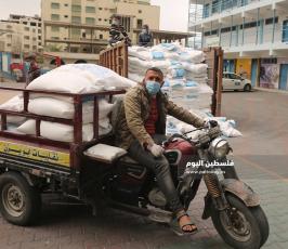  توزيع المساعدات الغذائية (15).JPG