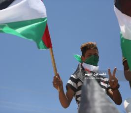 مسير للشاحنات يتوجه لمخيم ملكة شرق غزة رفضاً للحصار ‫(39256580)‬ ‫‬.JPG