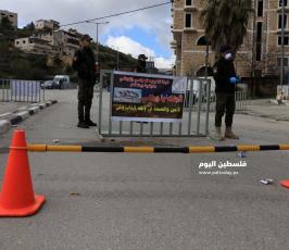 حواجز للامن الفلسطيني تفصل بين القرى والمخيمات وبين المدن في محافظة بيت لحم لمنع انتشار فيروس كورونا. (8).jpg