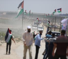 مسير للشاحنات يتوجه لمخيم ملكة شرق غزة رفضاً للحصار ‫(39256583)‬ ‫‬.JPG