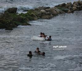 بحر غزة من حرارة الجو وانقطاع التيار الكهربائي (2).JPG