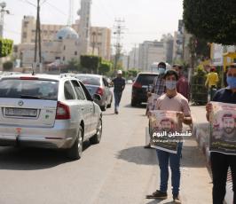 سلسلة بشرية بغزة تضامناً مع الاسير ماهر الاخرس (1).JPG
