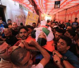  الشهيدين محمد شخصه والطفل اياد الشاعر ‫(42074640)‬ ‫‬.JPG