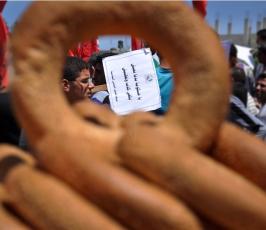بالصور:في فلسطين.. العمال يحتفلون بيومهم العالمي على طريقتهم الخاصة