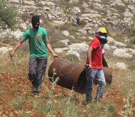 خاص فلسطين اليوم...مواجهات في دير جرير أثر قمع الاحتلال لمسيرة سلمية منددة بالاستيطان