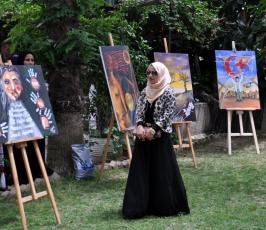 بالصورمعرض فني للرسم نظمه الصليب الأحمر بغزة عن احترام المهام الطبية  ‫(1)‬ ‫‬