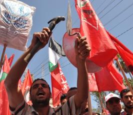 بالصور:في فلسطين.. العمال يحتفلون بيومهم العالمي على طريقتهم الخاصة