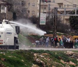 خاص فلسطين اليوم...مواجهات وإصابات أمام سجن "عوفر" غربي رام الله