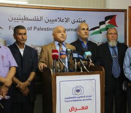 معرض صور من أجل الحقيقة ضمن فعاليات أسبوع التضامن مع الصحفي الفلسطيني ‫(30074254)‬ ‫‬