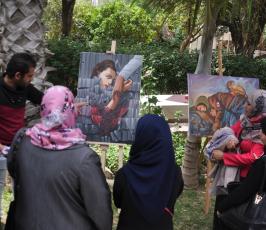 بالصورمعرض فني للرسم نظمه الصليب الأحمر بغزة عن احترام المهام الطبية  ‫(220537801)‬ ‫‬