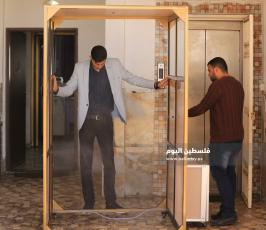 ممرًا لتعقيم الأشخاص لمواجهة تفشي فيروس كورونا (8).JPG
