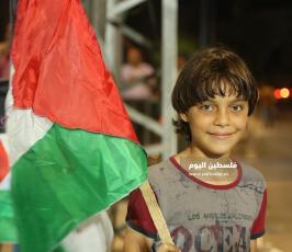 وقفة شعبية رفضاً للرشوة المالية ومخططات تصفية القضية الفلسطينية (2).JPG