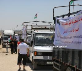 مسير للشاحنات يتوجه لمخيم ملكة شرق غزة رفضاً للحصار ‫(39256587)‬ ‫‬.JPG