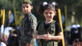 أطفال يباركون لحركة الجهاد الإسلامي في انطلاقتها الـ 35