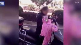 بالفيديو.. أم تقيد ابنها قبل سحله بدراجتها النارية