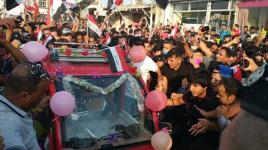 حفل زفاف (بالتك تك) وقوات الشغب تركص مظاهرات مدينة الحله..
