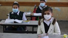 طلبة المرحلة الابتدائية في المدارس الحكومية يعودون لمدارسهم (13).jpeg